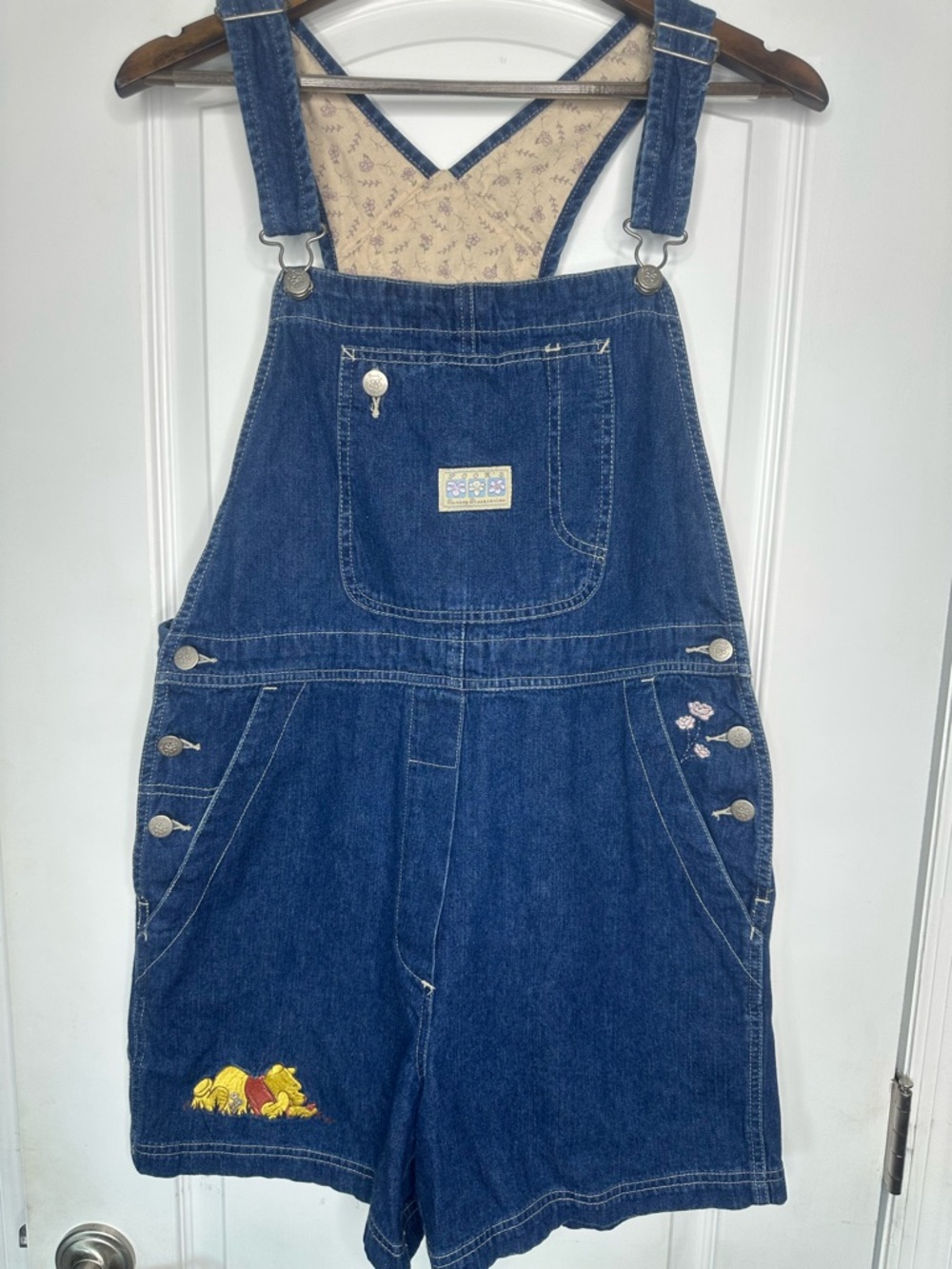 Vintage Disney Store Blue Denim Short Overalls with Winnie the Pooh Embroidery.